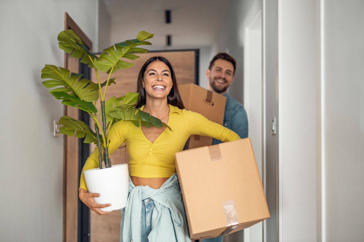 A couple moves into their first home.