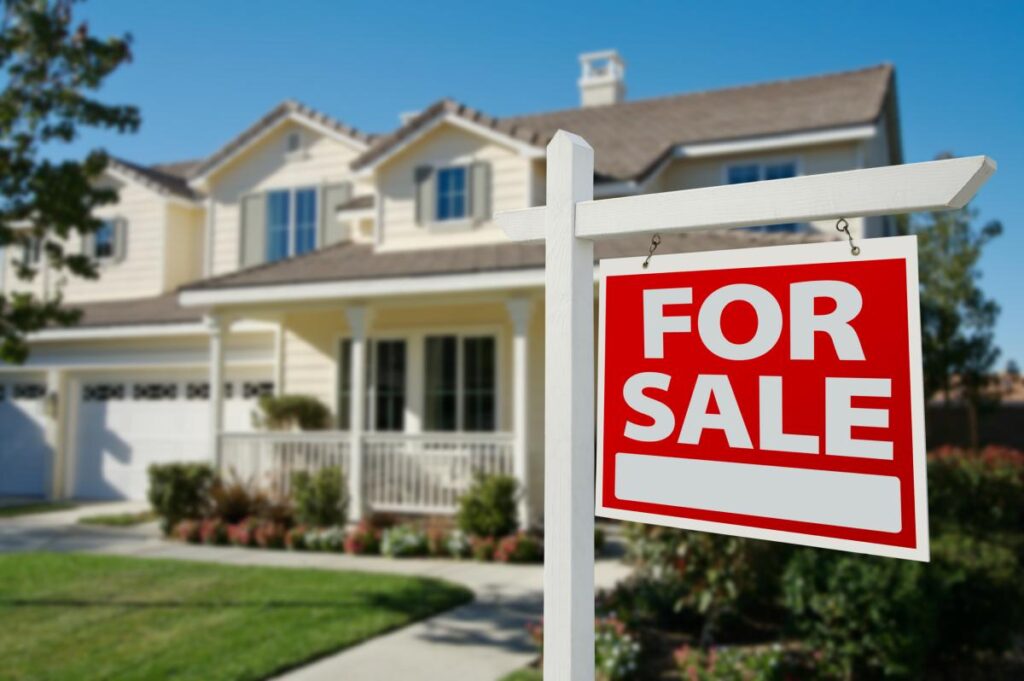 A home with a for sale sign