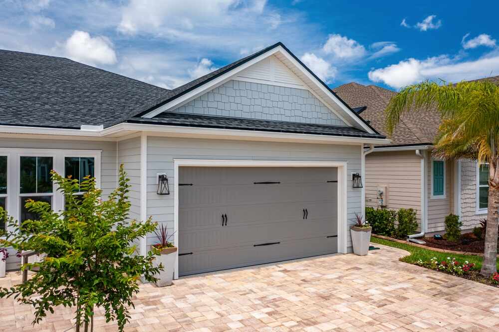 A home displaying its newly installed garage doors.