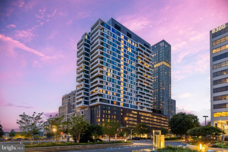 High-rise condominium tower at dusk, 1650 Silver Hill Drive 2309-1, Mclean, VA
