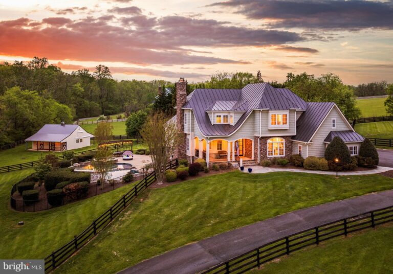 Aerial view of a home on a large lot at sunset, 18969 Peale Lane, Leesburg, VA