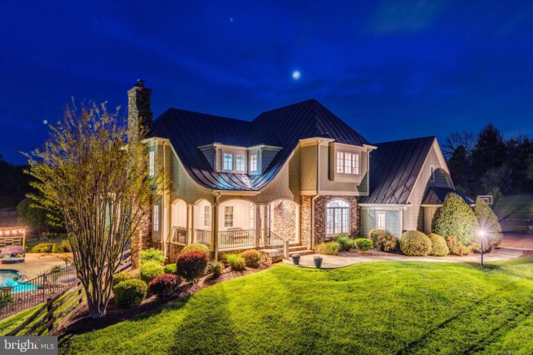 Large home with front lawn at night, 18969 Peale Lane, Leesburg, VA