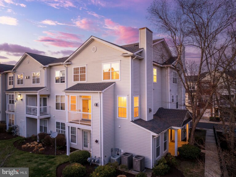 Townhomes with siding at dusk, 13057 Marcey Creek Road, Herndon, VA