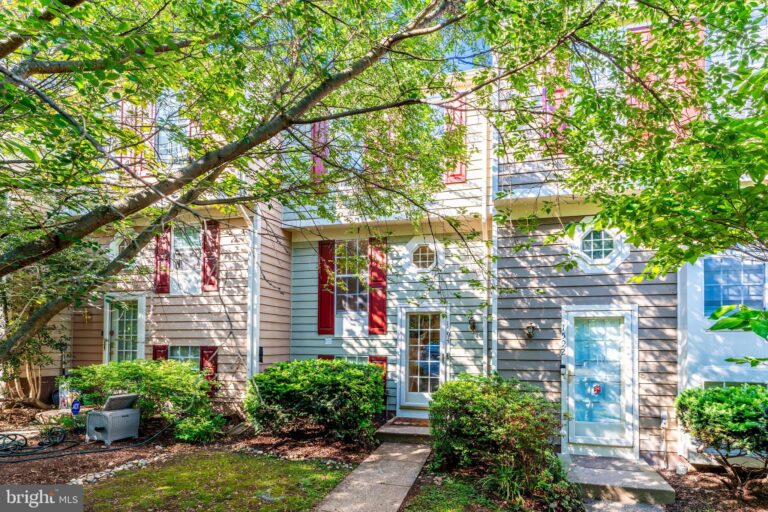 Townhome front entrance with trees, 1594 Woodcrest Drive, Reston, VA