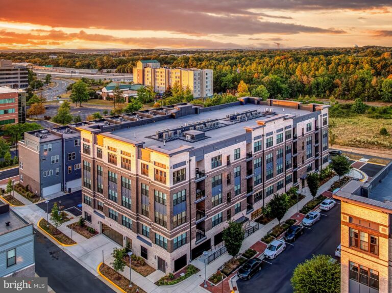 Aerial view of a new townhome building at sunset, 2320 Field Point Road 201, Herndon, VA
