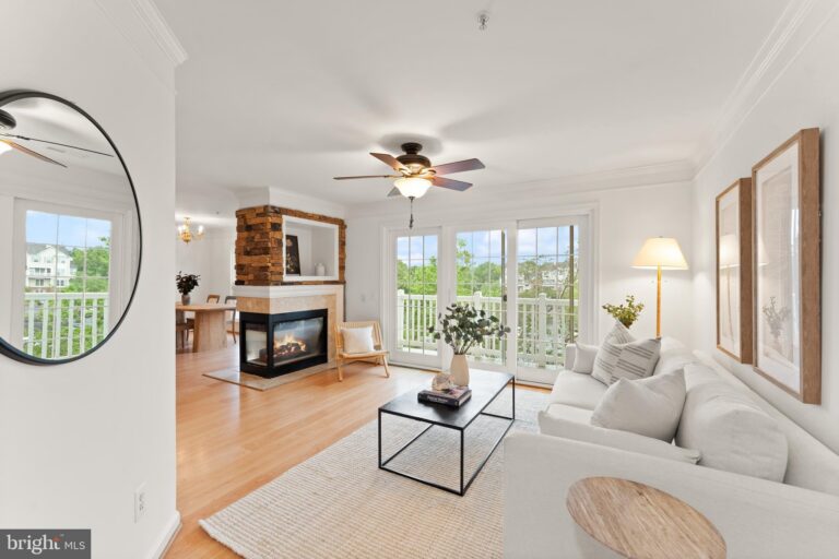 Living room with fireplace and ceiling fan, 21777 Baldwin Square 301, Sterling, VA