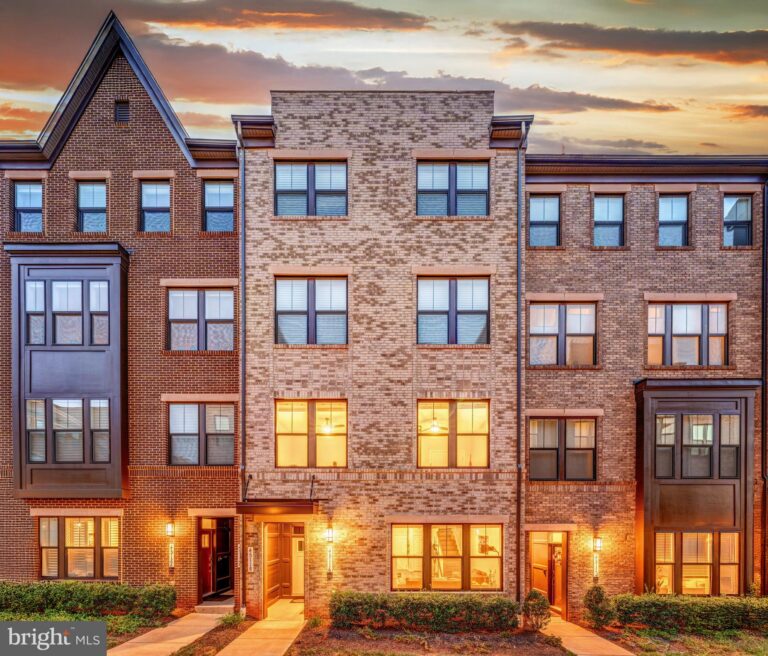 Row of brick townhomes at dusk, 45116 Admiral Drive 1307, Sterling, VA