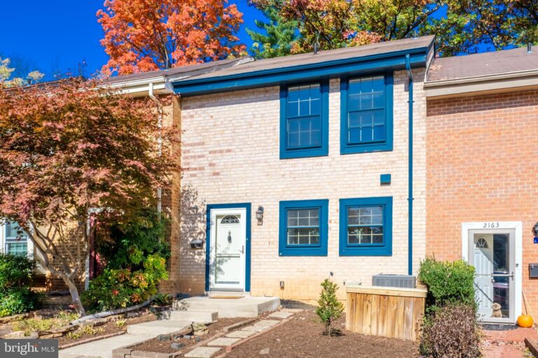 White brick townhome with blue shutters, 2165 Golf Course Drive, Reston, VA