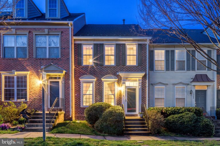 Brick townhome with lit lamppost, 1270 Vintage Place, Reston, VA