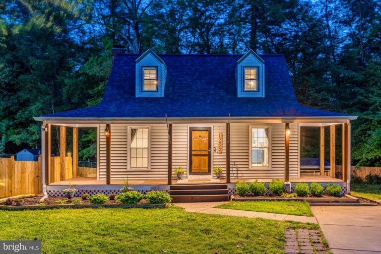 Cape Cod style home with dormers at dusk, 13822 Rockford Court, Woodbridge, VA