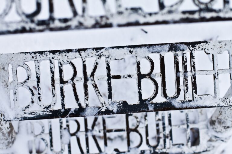 Weathered 'Burke Built' lettering on a vintage sign in Burke, Virginia