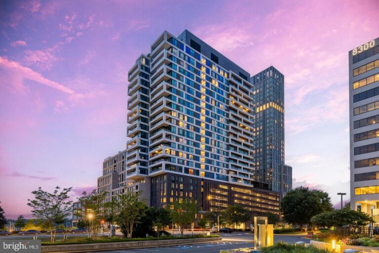 High-rise condominium tower at dusk, 1650 Silver Hill Drive 2309-1, Mclean, VA