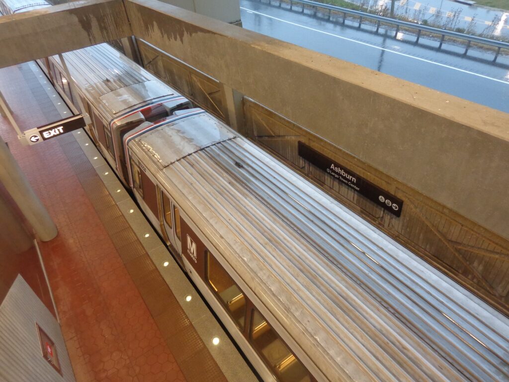 Silver Line train at the Ashburn Metro station platform in the Dulles Greenway median, Ashburn, Virginia