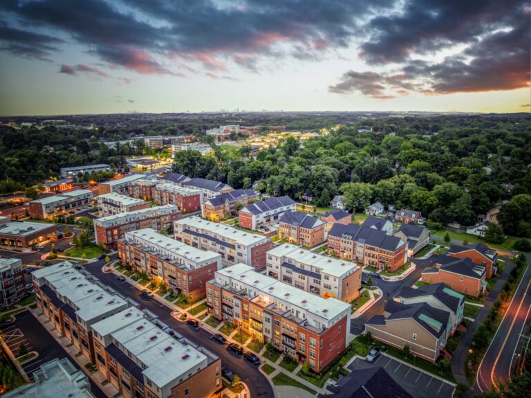 Aerial view of the Towns at Boulevard VI townhomes at dusk, Fairfax, Virginia
