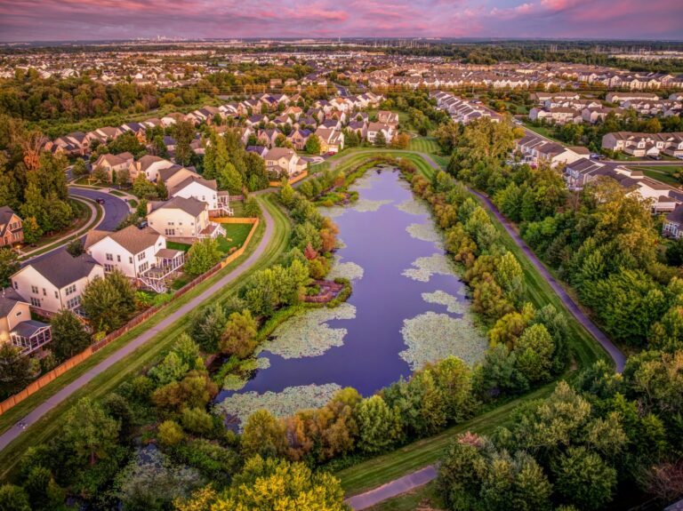 Aerial view of a pond and walking trail in Brambleton, Virginia