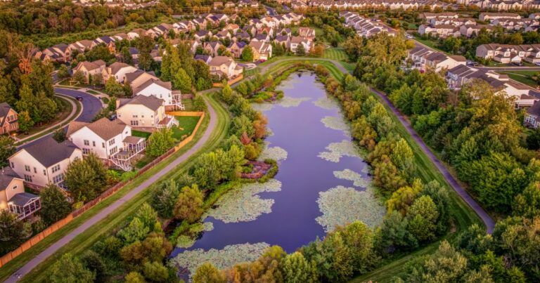 Aerial view of a pond and walking trail in Brambleton, Virginia