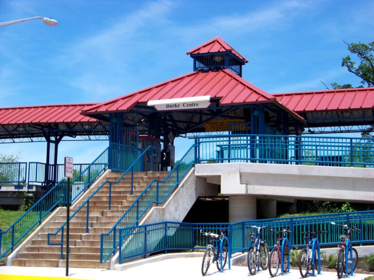 The Burke Centre VRE station entrance with its red roof and station sign