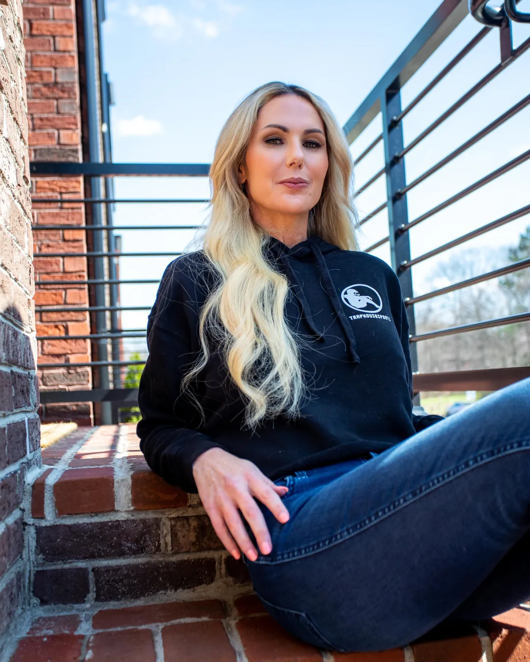 Nikki Lagouros, Northern Virginia realtor, seated outdoors